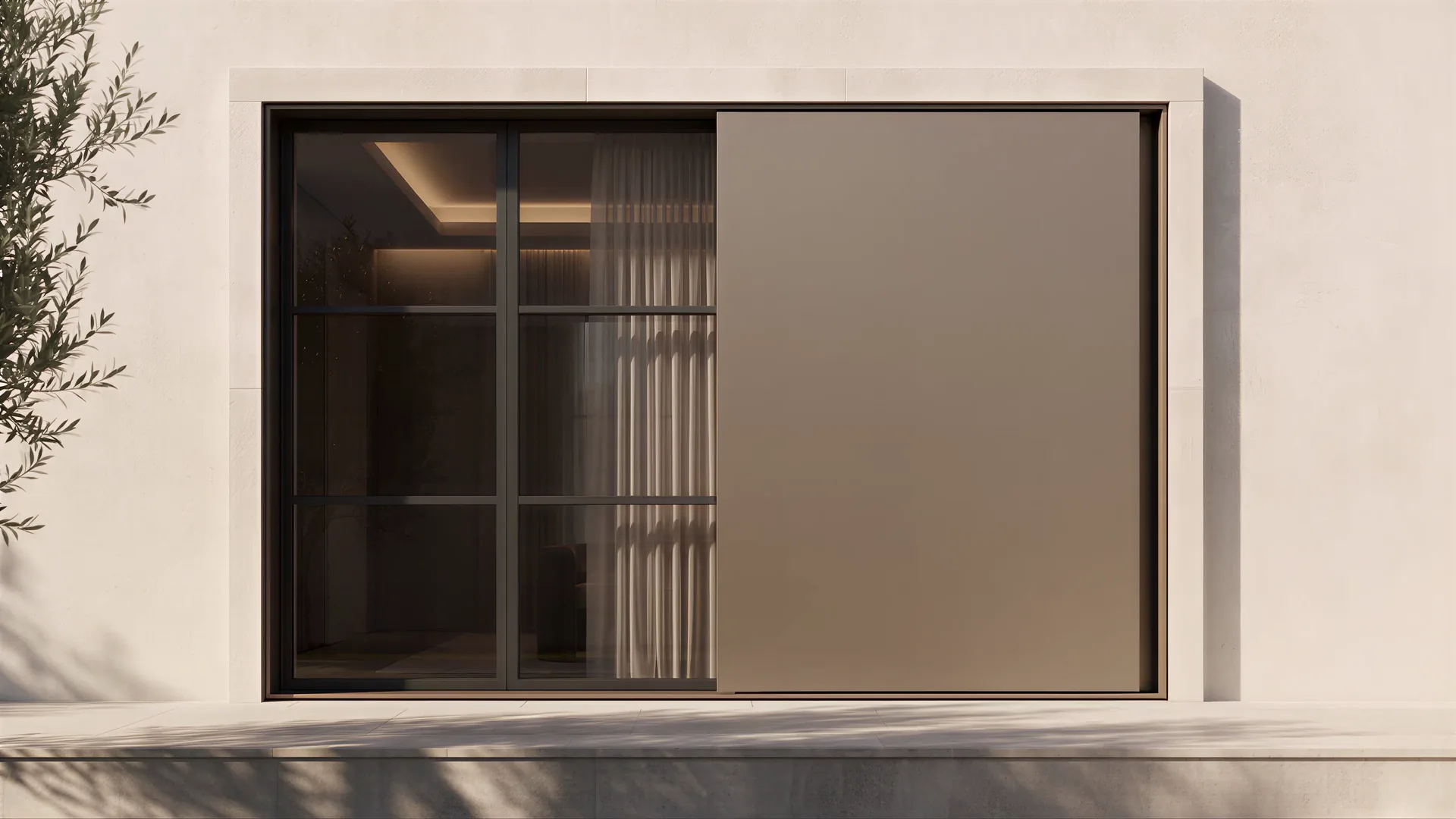 A separate material concept: a bronze toned panel beside pale stone and dark glazing